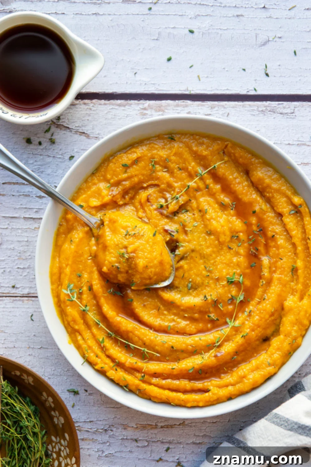 Creamy Maple Butternut Mash 6 A bowl of rich maple mashed butternut squash, perfectly smooth and ready to serve.