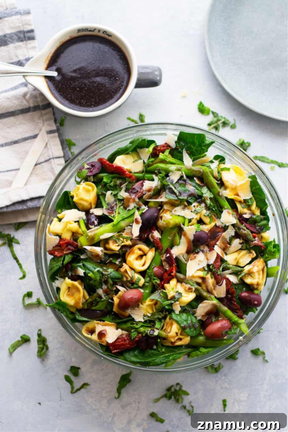 Portion of Tuscan Tortellini Salad in a bowl, ready to be served.