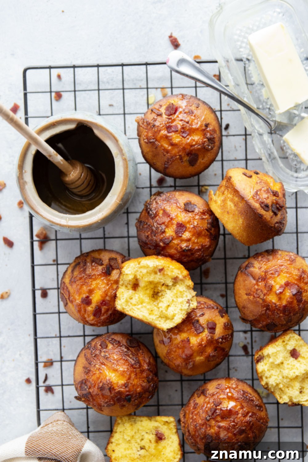 Loaded Bacon Cheddar Cornbread Muffins 6 Stack of fluffy cornbread muffins with bacon and cheddar cheese