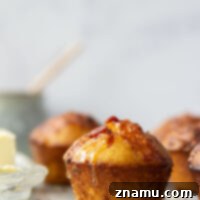 Loaded Bacon Cheddar Cornbread Muffins 8 Rich cheddar and crispy bacon bits are the perfect cornbread pairing in these soft and fluffy bacon cheddar cornbread muffins.