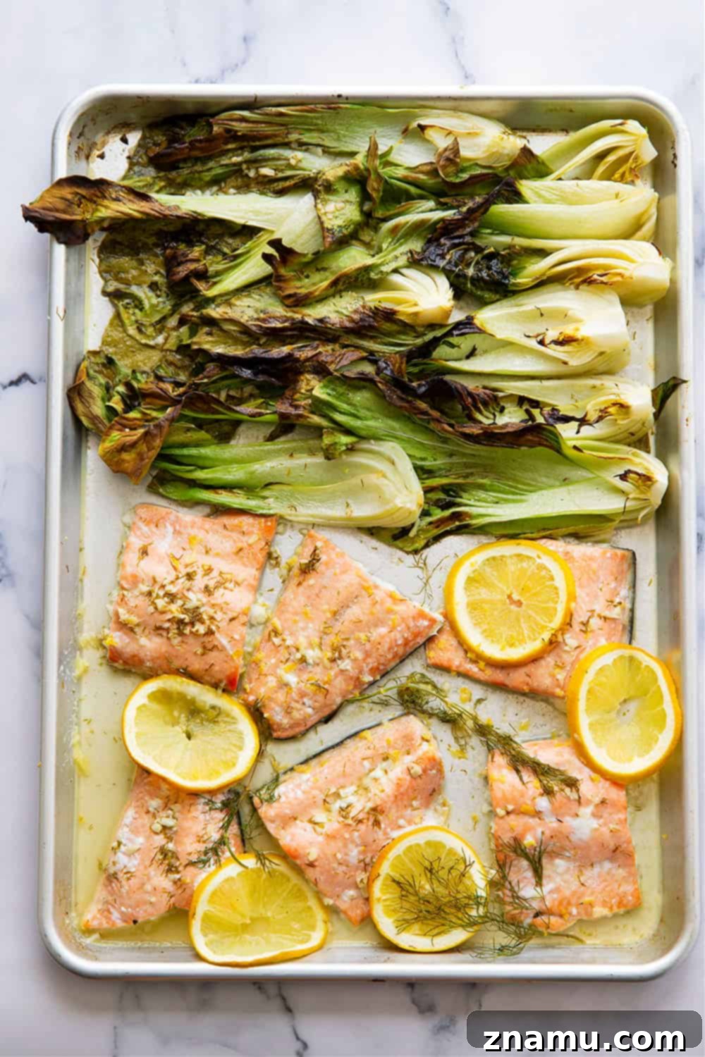 Tek Tepside Limonlu Dereotlu Somon ve Bebek Pak Choi 3 Lemon dill salmon with tender baby bok choy bakes up entirely on one sheet pan in 35 minutes for an easy, flavor-packed weeknight dinner!
