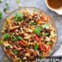 Thai Soba Noodle Salad is packed with a rainbow of fresh veggies, tender buckwheat soba noodles, juicy peanut grilled chicken, and a creamy peanut dressing.