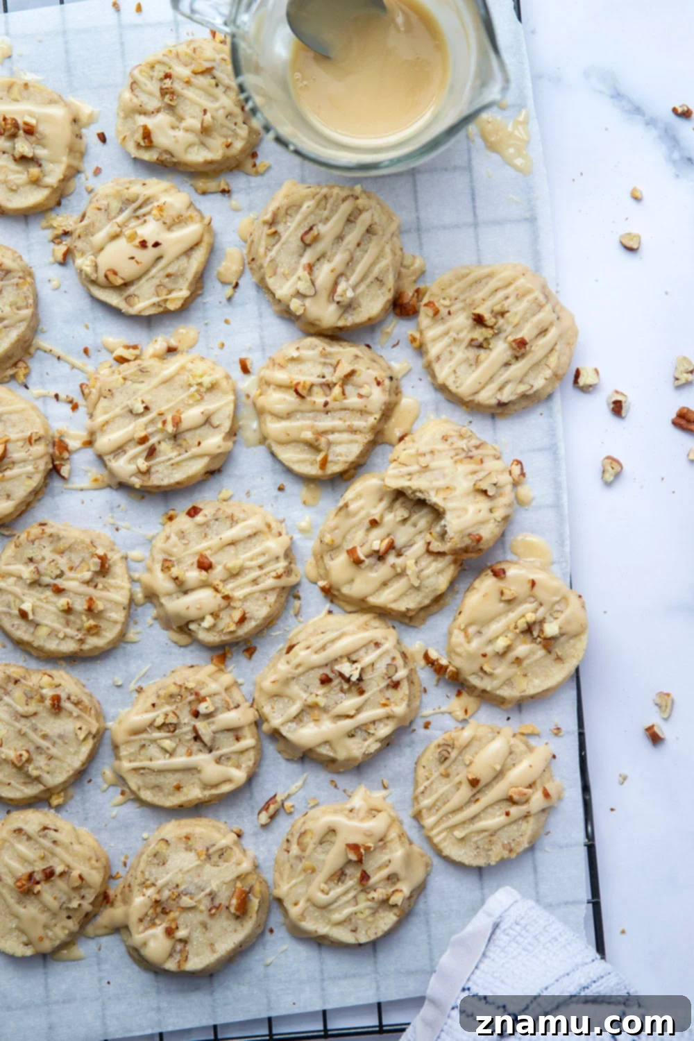 Golden Buttery Pecan Shortbread Delights 4 These butter pecan shortbread cookies are crisp on the outside and perfectly soft on the inside with lots of buttery toasted pecan bits.