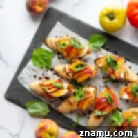 Juicy peaches and all the classic caprese ingredients collide in this summery caprese peach bruschetta that's quick to whip up and perfect for summer entertaining!