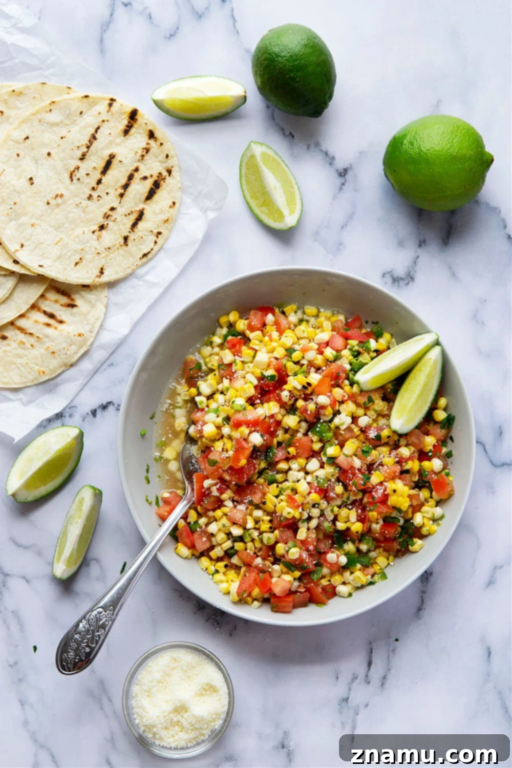 Smoky Chipotle Steak Tacos with Fire-Roasted Corn Salsa 4 Grilled chipotle steak tacos feature juicy grilled steak with a punch of smoky heat and piled high with a flavorful charred sweet corn salsa!