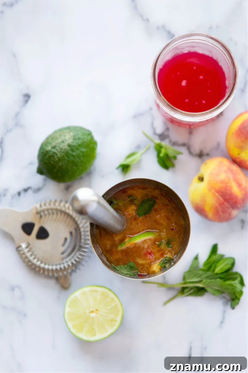 Rhubarb Peach Bourbon Elixir 4 Ingredients for a Rhubarb Peach Bourbon Smash, including fresh peaches, rhubarb syrup, bourbon, lime, and mint.