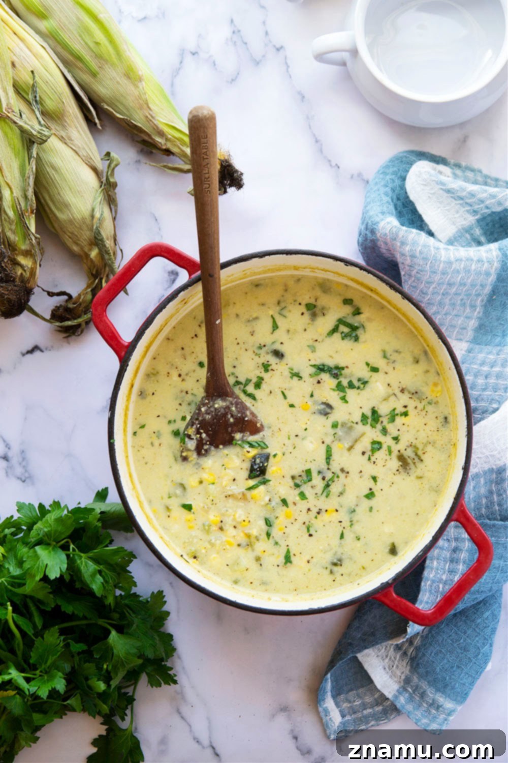Creamy Poblano Coconut Corn Chowder 3 Charred sweet corn and poblano peppers add an incredible depth of flavor to this creamy coconut milk corn chowder. - easy to make a big batch of AND vegan!