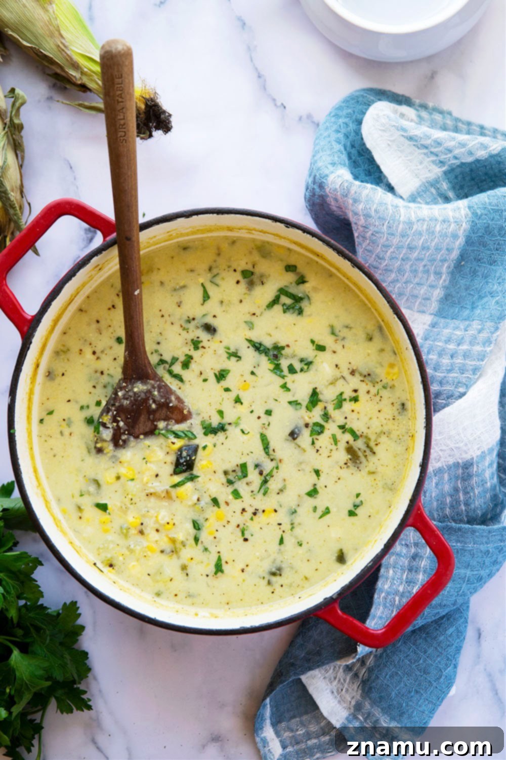 Creamy Poblano Coconut Corn Chowder 4 Charred sweet corn and poblano peppers add an incredible depth of flavor to this creamy coconut milk corn chowder. - easy to make a big batch of AND vegan!