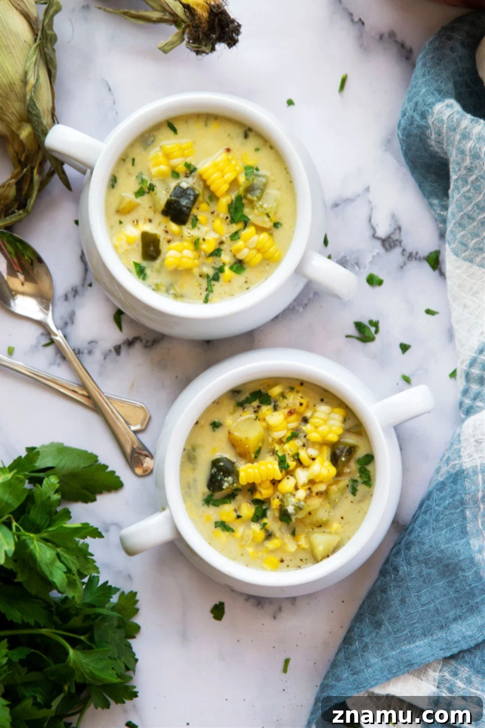 Creamy Poblano Coconut Corn Chowder 5 Charred sweet corn and poblano peppers add an incredible depth of flavor to this creamy coconut milk corn chowder. - easy to make a big batch of AND vegan!