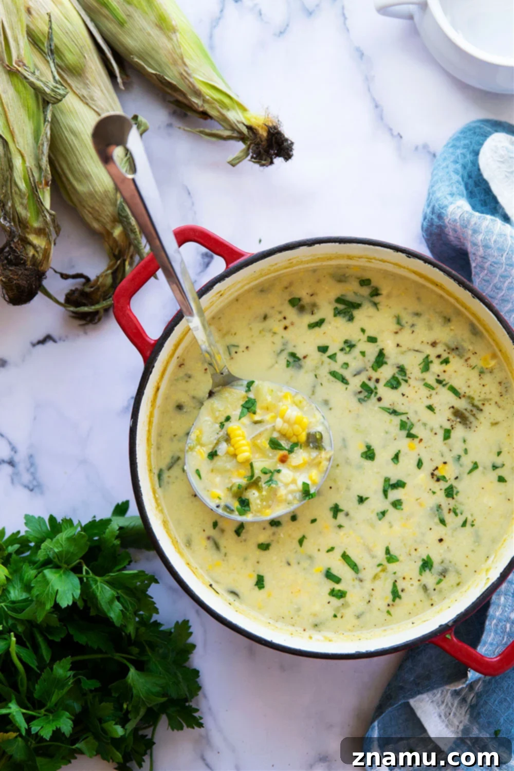 Creamy Poblano Coconut Corn Chowder 6 Charred sweet corn and poblano peppers add an incredible depth of flavor to this creamy coconut milk corn chowder. - easy to make a big batch of AND vegan!
