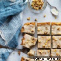 This banana zucchini cake is incredibly soft and loaded with flavorful browned butter and crunchy walnuts. - a perfect breakfast, dessert, or snack cake!