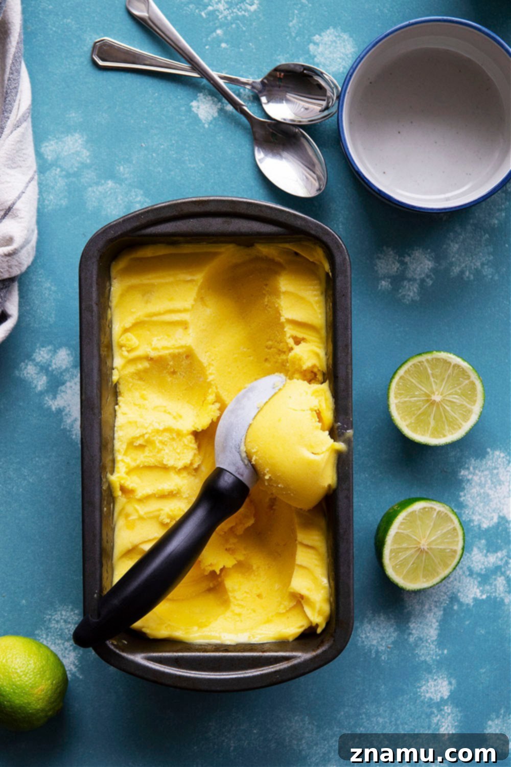 Tropical No Churn Mango Pineapple Sorbet 5 Blender with frozen fruit and other ingredients, ready to be processed into sorbet.