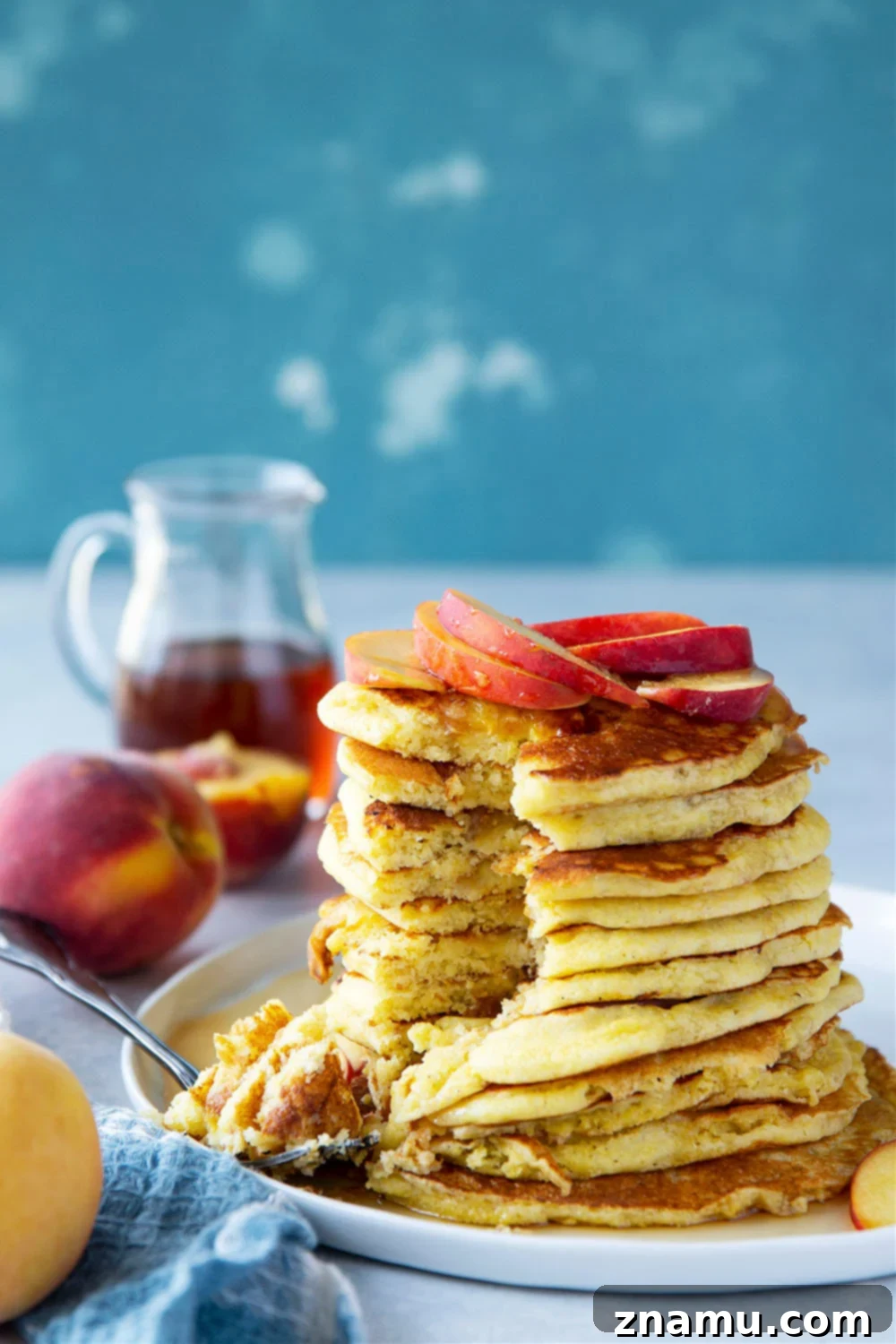 Golden Peach Cornmeal Pancakes 6 Juicy summer peaches and hearty cornmeal star in these tender, fluffy cornmeal peach pancakes that are a perfect stack for summer!
