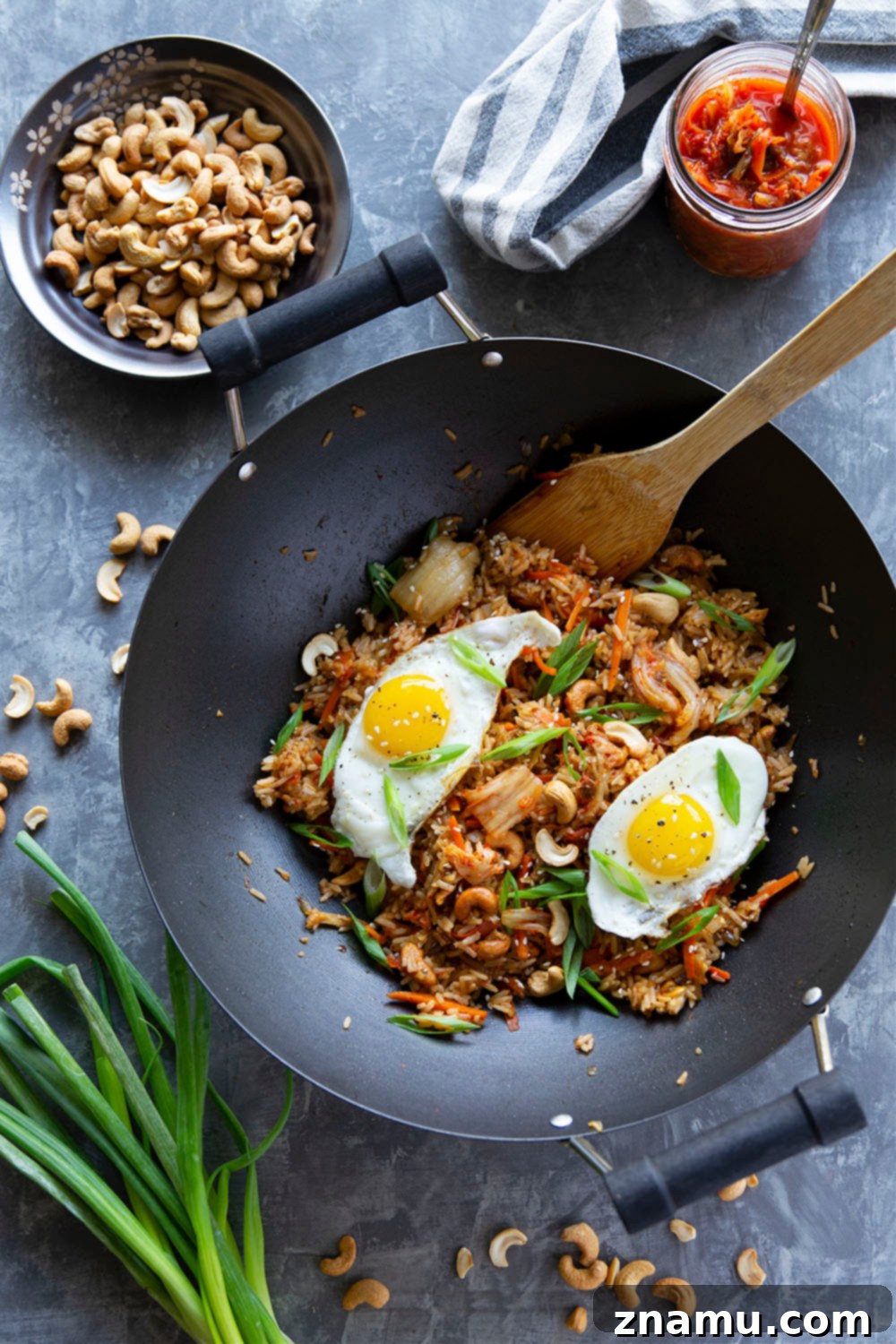 Spicy Kimchi Cashew Fried Rice 5 Flavorful kimchi and crunchy cashews take this kimchi cashew fried rice to the next level! Made easily in minutes with basic pantry ingredients and so much better than any takeout.