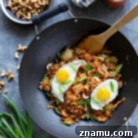 Spicy Kimchi Cashew Fried Rice 8 Flavorful kimchi and crunchy cashews take this kimchi cashew fried rice to the next level! Made easily in minutes with basic pantry ingredients and so much better than any takeout.