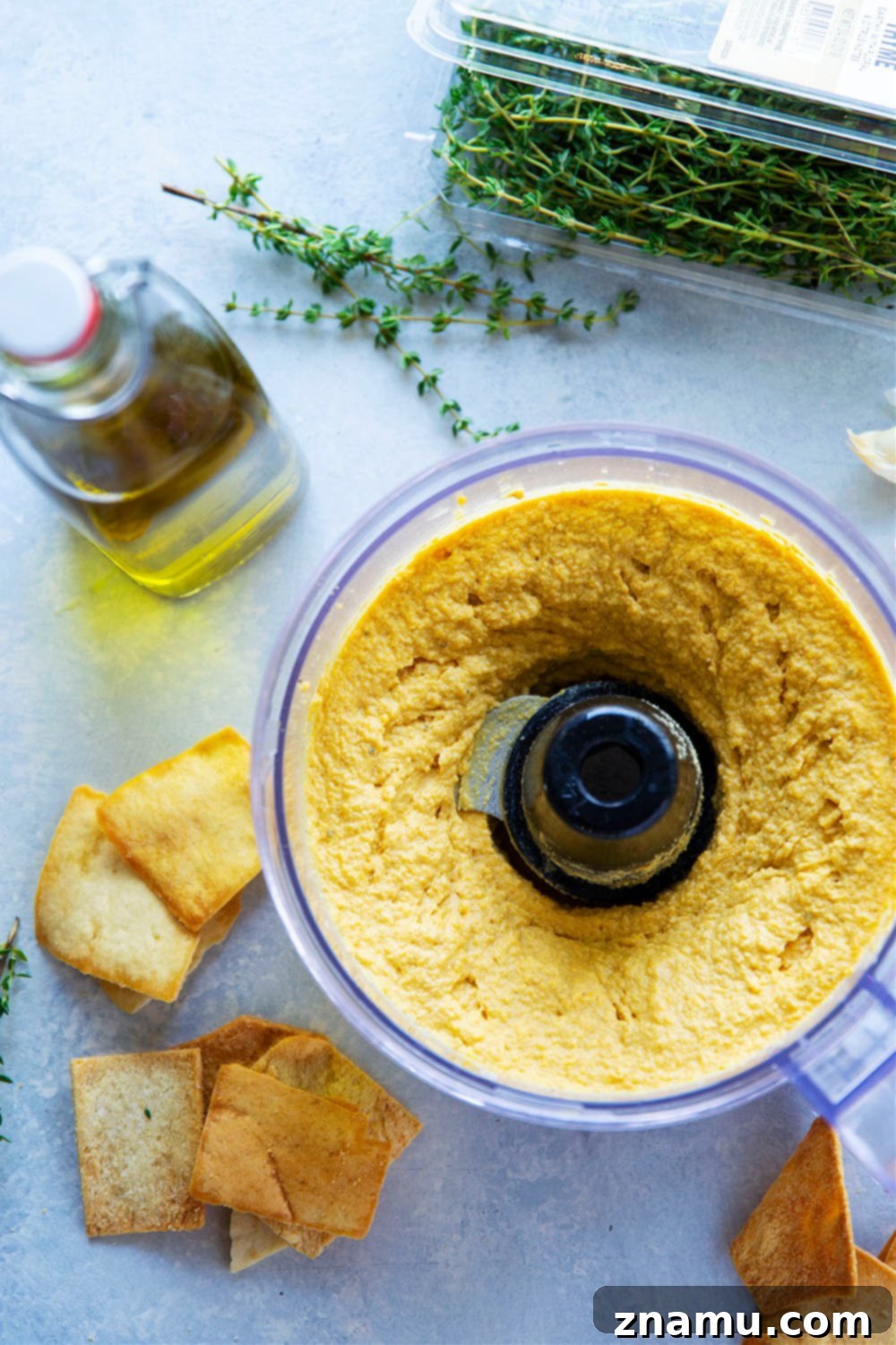 Velvety Roasted Garlic Butternut Squash Hummus 4 Flavorful roasted garlic and butternut squash gives this butternut squash hummus an unmatchable silky texture that you won't be able to keep those pita chips out of!
