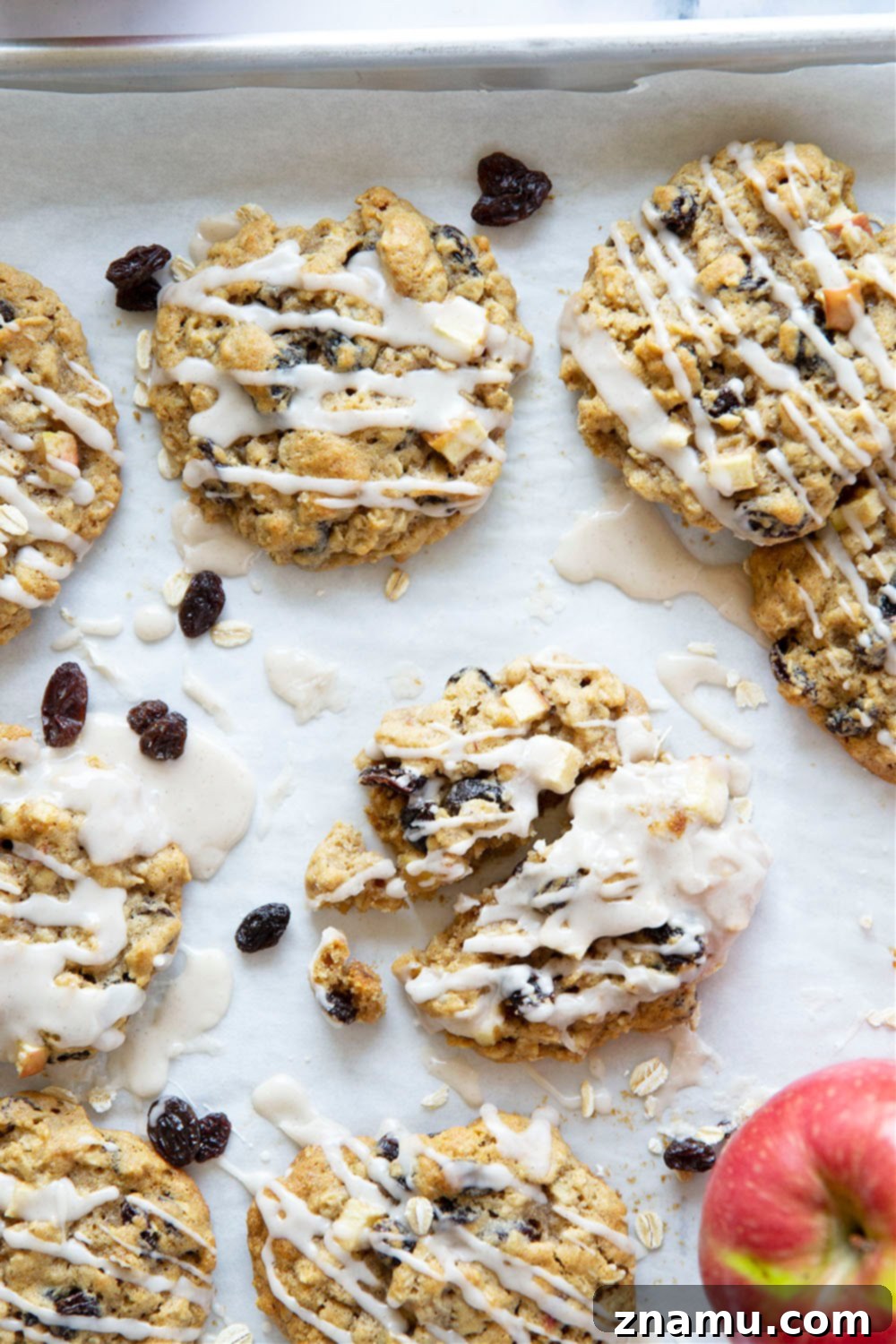 Sweetly Glazed Apple & Raisin Oatmeal Cookies 6 Platter of finished Iced Oatmeal Raisin Apple Cookies, ready to serve.