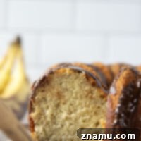 Super moist and melt-in-your-mouth banana pound cake served with a rich chocolate glaze and perfect for any cake event!