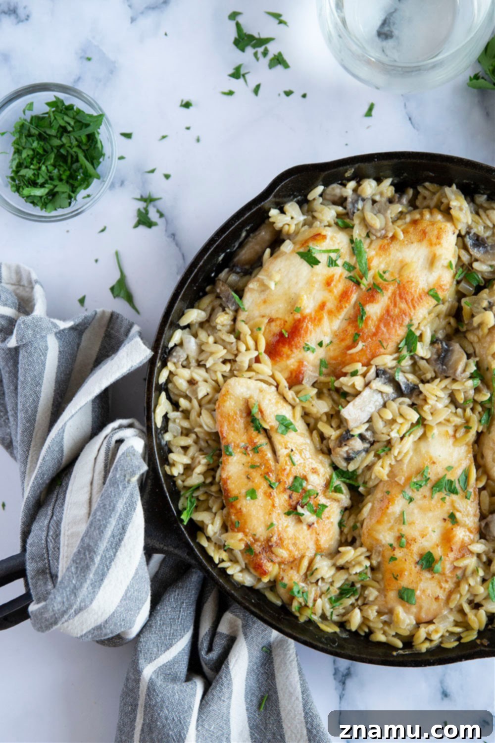 Creamy One-Pot Chicken Marsala Orzo 3 Creamy One-Pot Chicken Marsala Orzo with mushrooms.