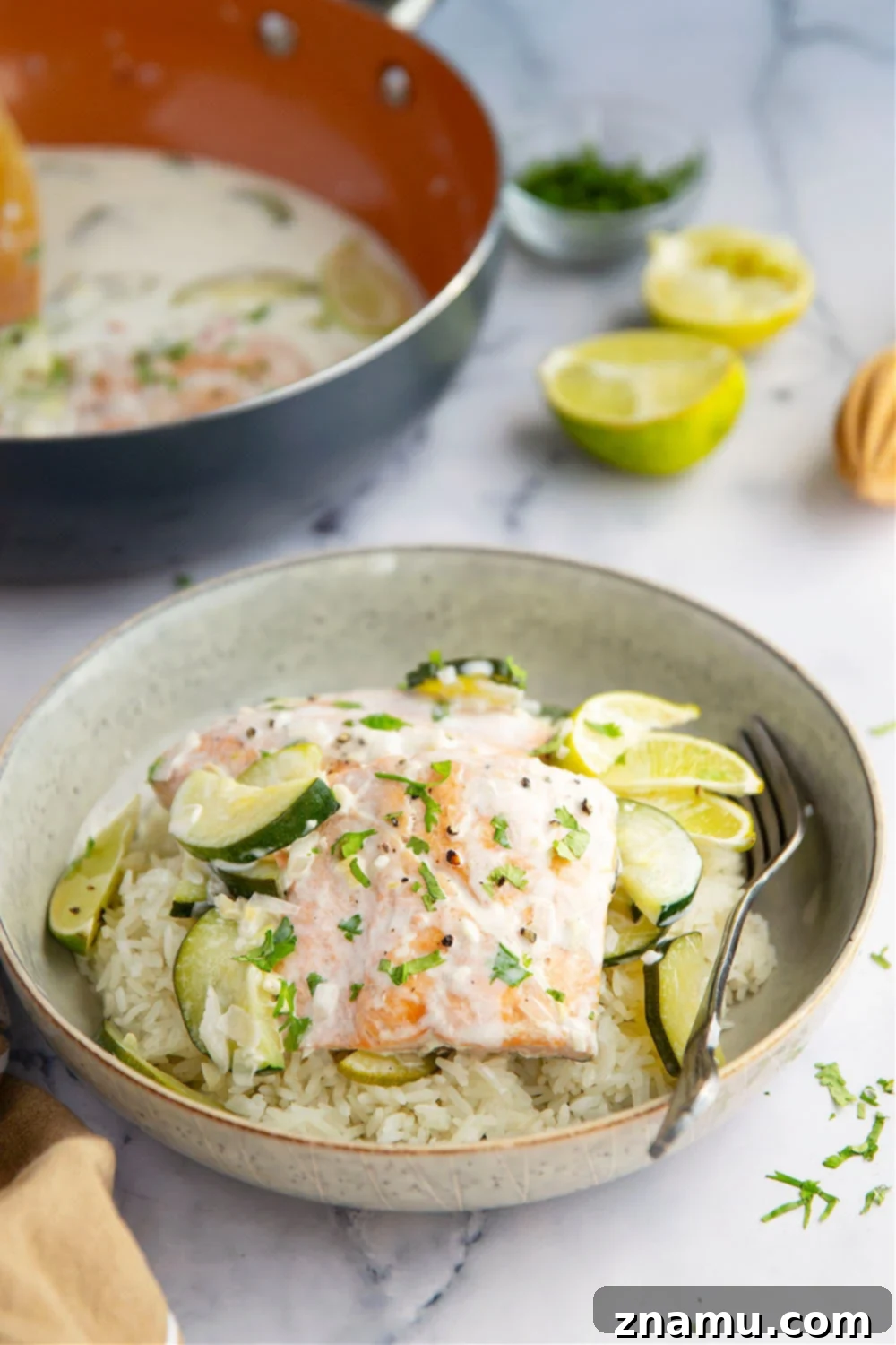 Creamy Coconut Salmon Skillet 6 The complete Skillet Coconut Milk Salmon dish in the pan, garnished and ready to be served.