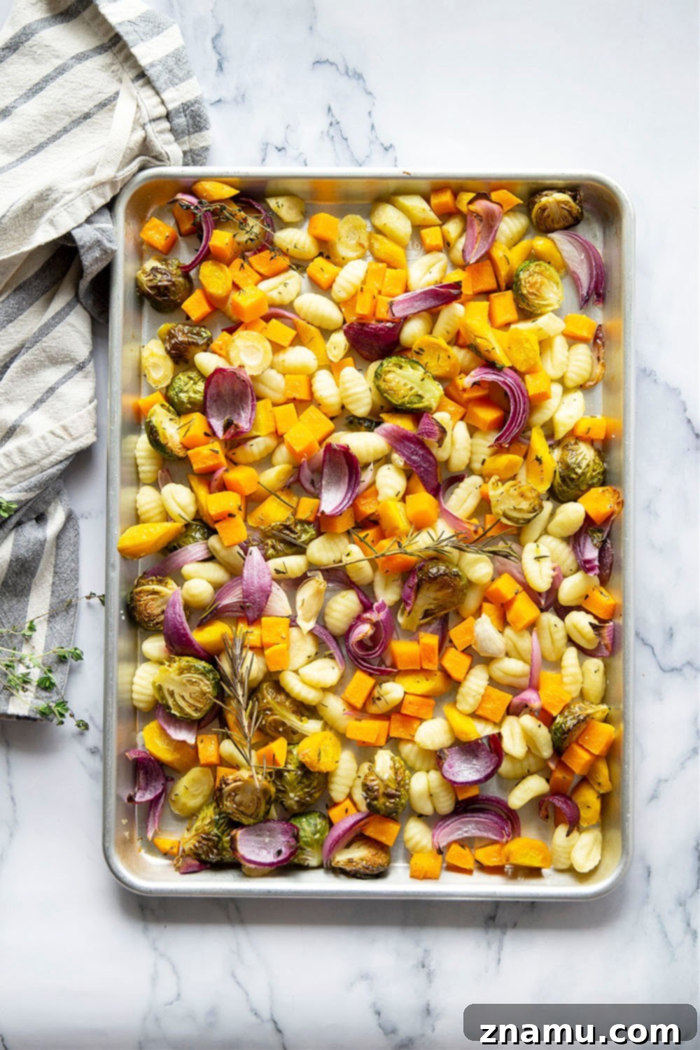 One-Pan Autumn Gnocchi & Roasted Vegetables 5 Sheet pan gnocchi is roasted with hearty fall vegetables entirely on one sheet pan in less than hour for an an easy weeknight dinner with little to no cleanup!