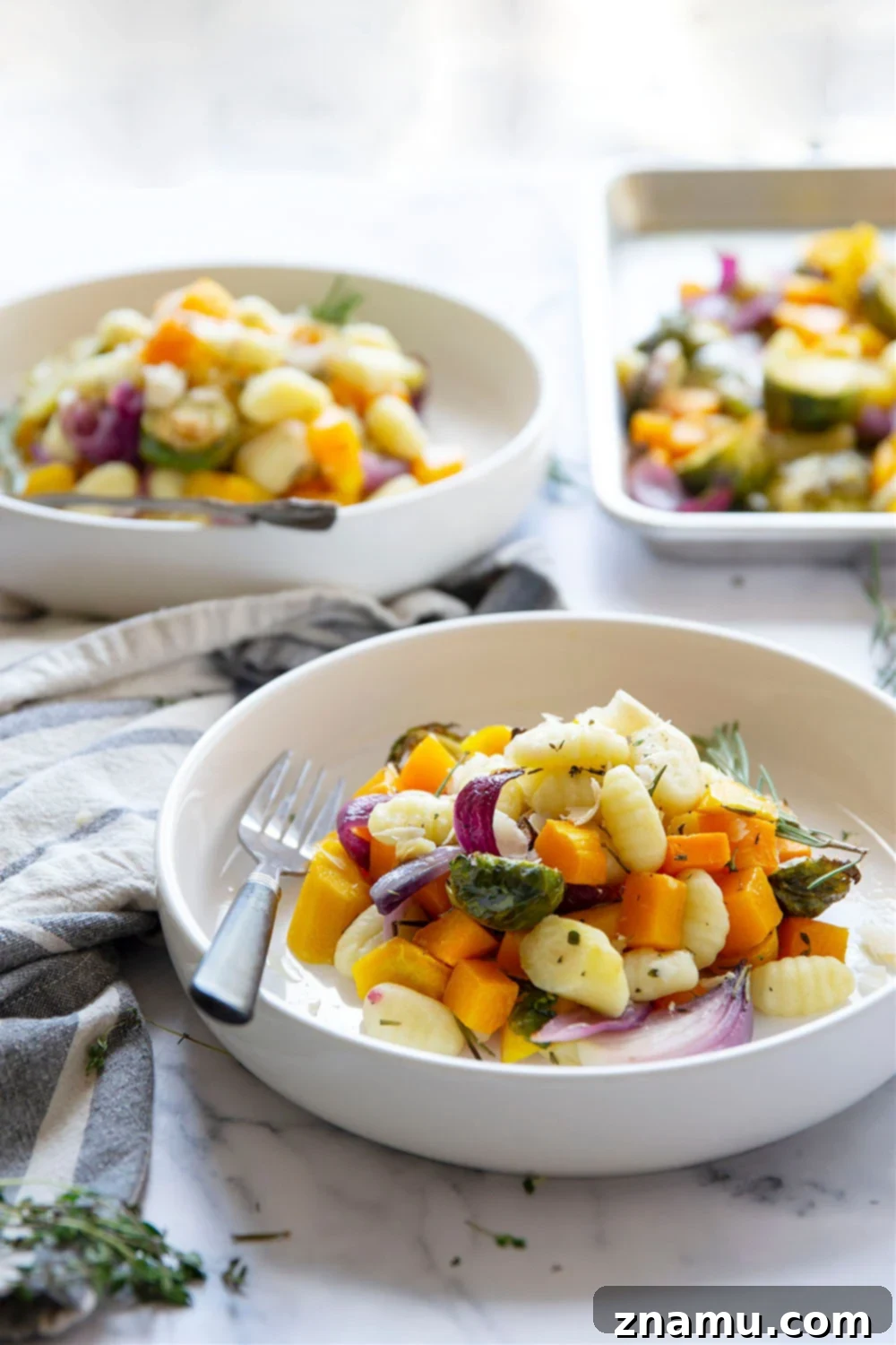 One-Pan Autumn Gnocchi & Roasted Vegetables 6 Sheet pan gnocchi is roasted with hearty fall vegetables entirely on one sheet pan in less than hour for an an easy weeknight dinner with little to no cleanup!