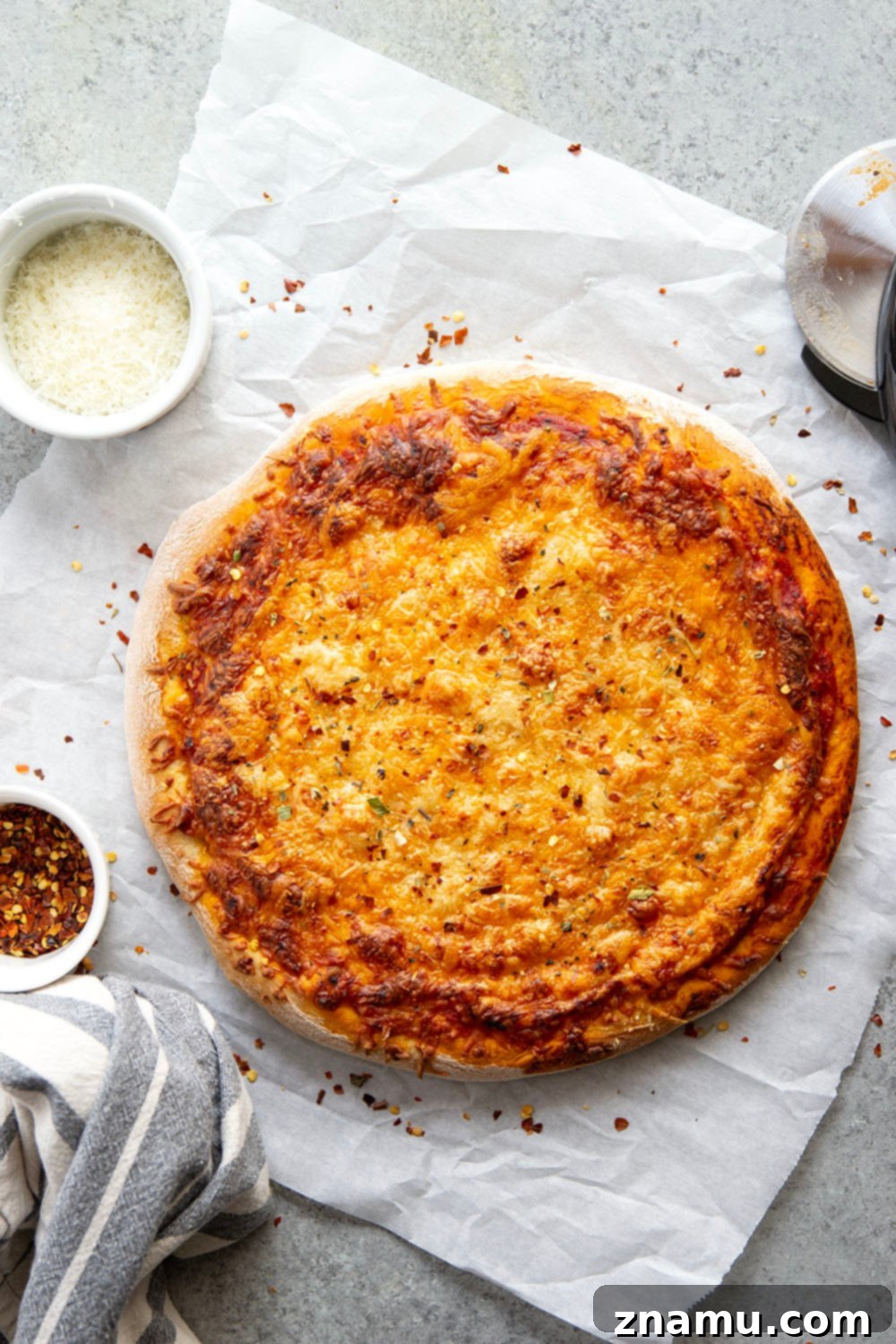 Triple Cheese Delight 3 A triple-cheese delight, this three cheese pizza features a perfectly soft and chewy homemade crust and lots of mozzarella, cheddar, and Parmesan.