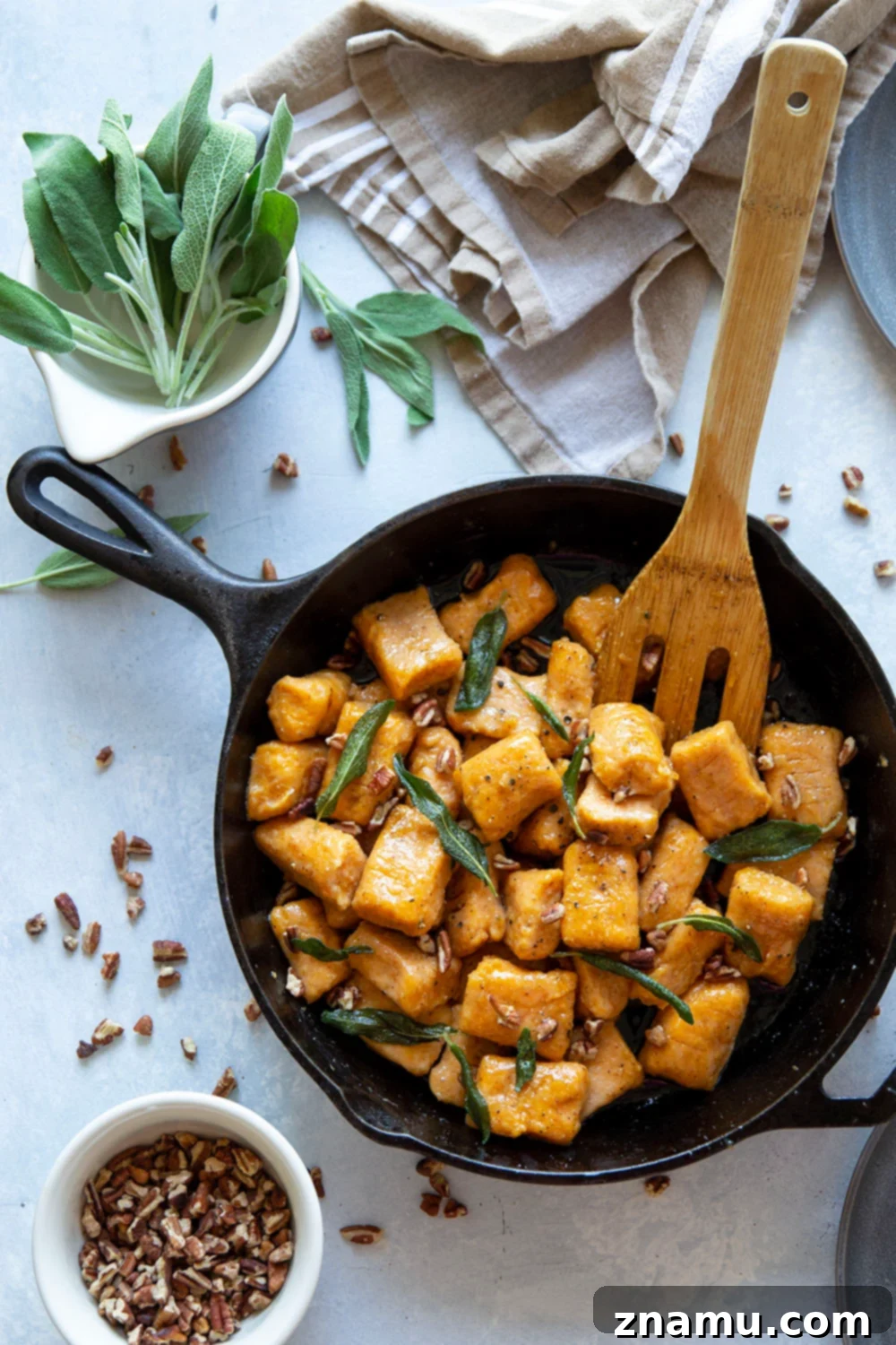 Maple Sage Sweet Potato Gnocchi 2 Sweet potato gnocchi is incredibly easy to make at home and perfectly light and fluffy! Toss this gnocchi with a sweet maple butter sauce and lots of crispy sage.