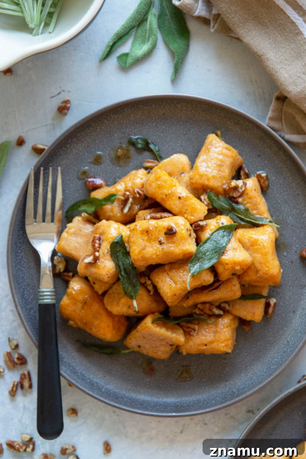 Maple Sage Sweet Potato Gnocchi 5 Sweet potato gnocchi is incredibly easy to make at home and perfectly light and fluffy! Toss this gnocchi with a sweet maple butter sauce and lots of crispy sage.