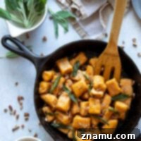 Sweet potato gnocchi is incredibly easy to make at home and perfectly light and fluffy! Toss this gnocchi with a sweet maple butter sauce and lots of crispy sage.