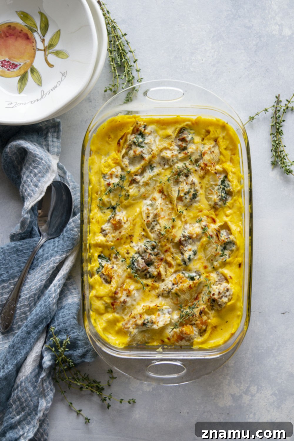 Golden Butternut Sausage Stuffed Shells 5 Creamy butternut squash alfredo sauce and flavorful sausage are featured in these luscious butternut squash stuffed shells. - easy to make ahead of time and perfect for any dinner occasion!