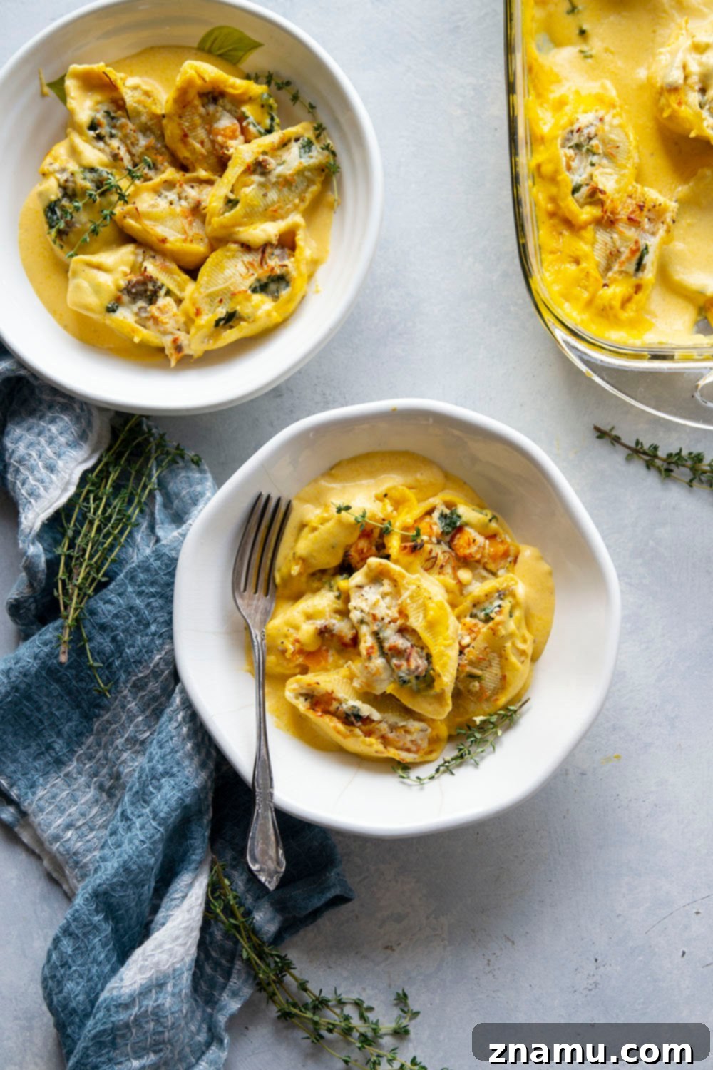 Golden Butternut Sausage Stuffed Shells 6 Creamy butternut squash alfredo sauce and flavorful sausage are featured in these luscious butternut squash stuffed shells. - easy to make ahead of time and perfect for any dinner occasion!