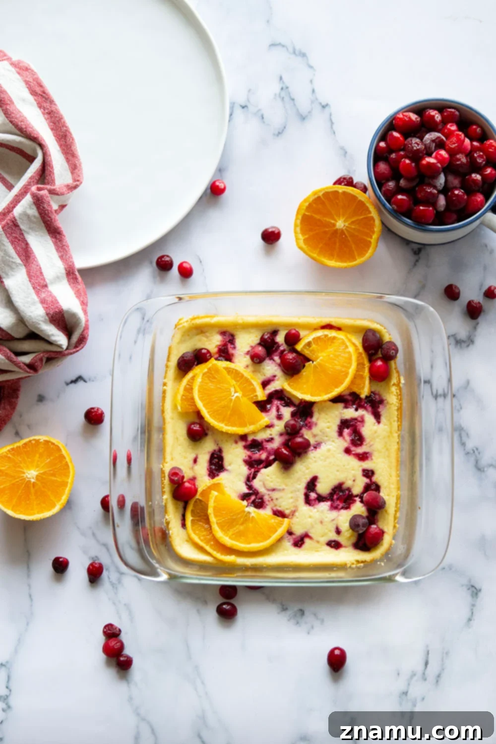 Zesty Orange Cranberry Cheesecake Bars 3 Swirled with a tangy cranberry sauce and loaded with tons of orange flavor, these orange cranberry cheesecake bars are easy to make and a standout on any holiday table!