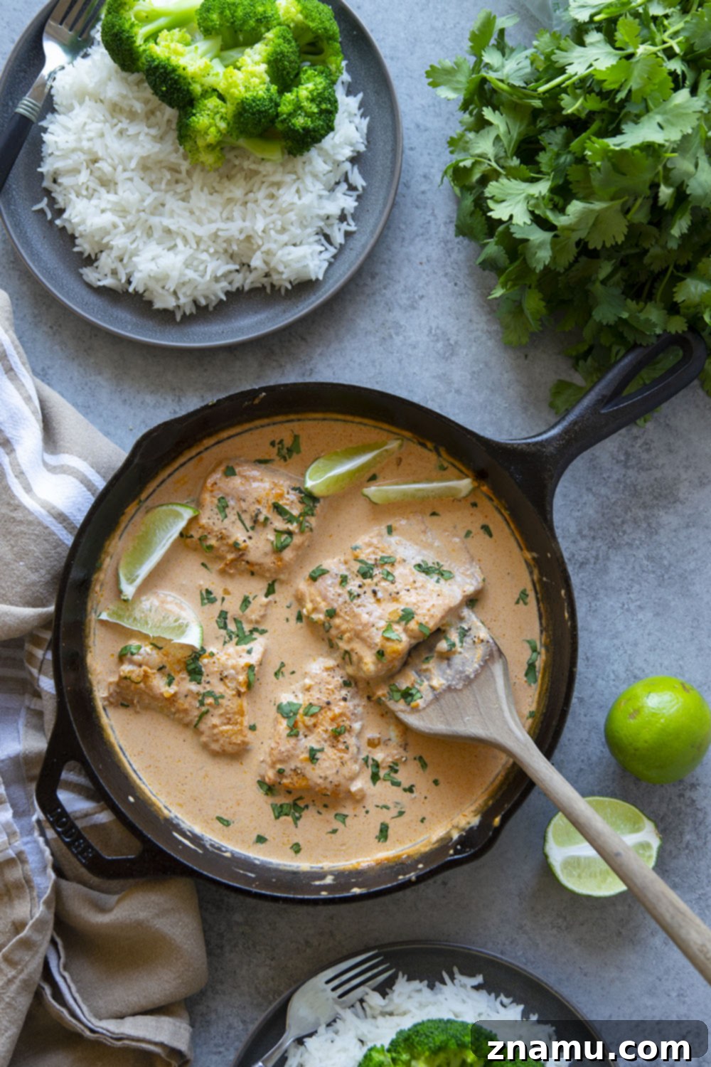 Fragrant Thai Coconut Salmon Curry 3 Thai coconut curry salmon features pan seared salmon simmered in a creamy coconut curry sauce and served over hot rice with plenty of lime and cilantro.