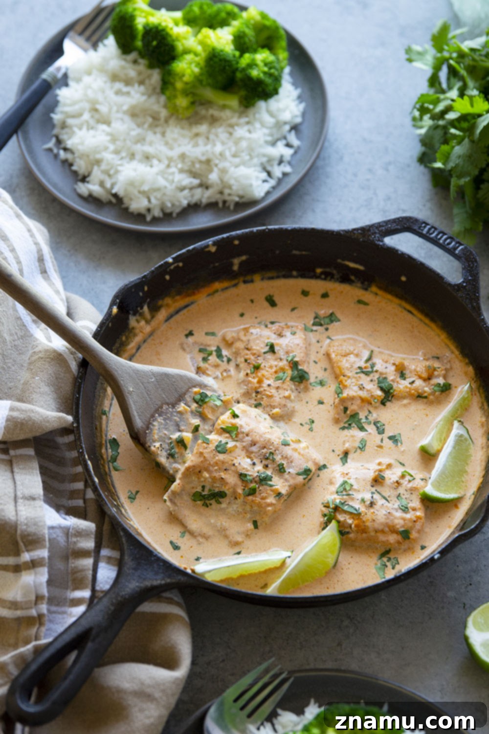 Fragrant Thai Coconut Salmon Curry 6 Thai coconut curry salmon features pan seared salmon simmered in a creamy coconut curry sauce and served over hot rice with plenty of lime and cilantro.