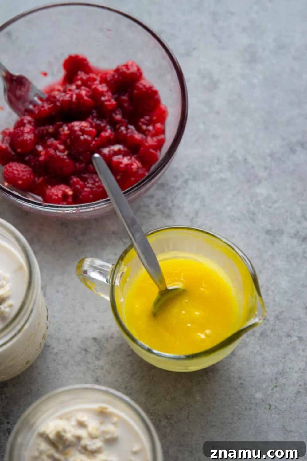 Zesty Lemon Curd Raspberry Overnight Oats 4 Tangy lemon curd and a juicy fresh raspberry sauce are swirled into these creamy overnight oats for an easy make-ahead breakfast treat!