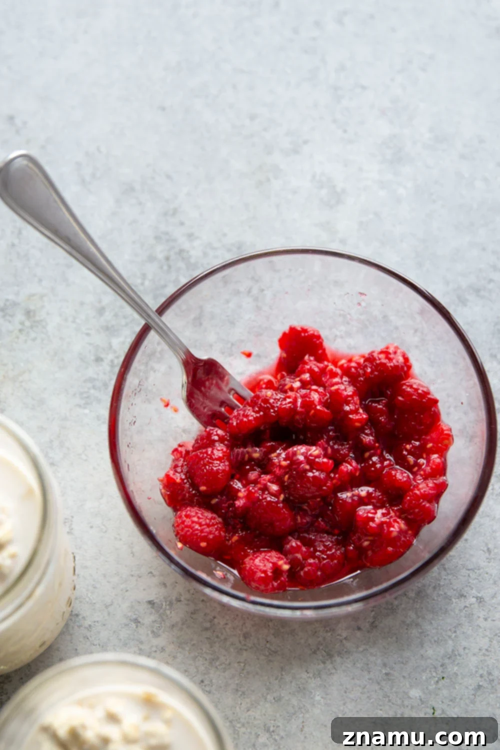 Zesty Lemon Curd Raspberry Overnight Oats 5 Tangy lemon curd and a juicy fresh raspberry sauce are swirled into these creamy overnight oats for an easy make-ahead breakfast treat!