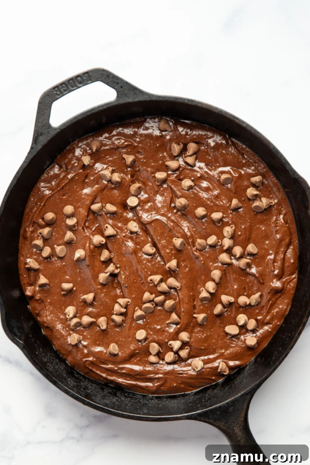 Ultimate Double Chocolate Skillet Brownies 3 Rich and fudgy double chocolate skillet brownies baked in a cast iron skillet and incredible with a scoop of vanilla ice cream on top!