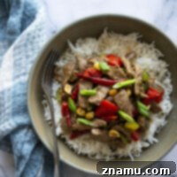 Szechuan Chili Peanut Beef 8 Kung Pao Beef features tender beef strips with spicy chili peppers and crunchy peanuts in a savory sauce. --- ready in under an hour and so much better than takeout!