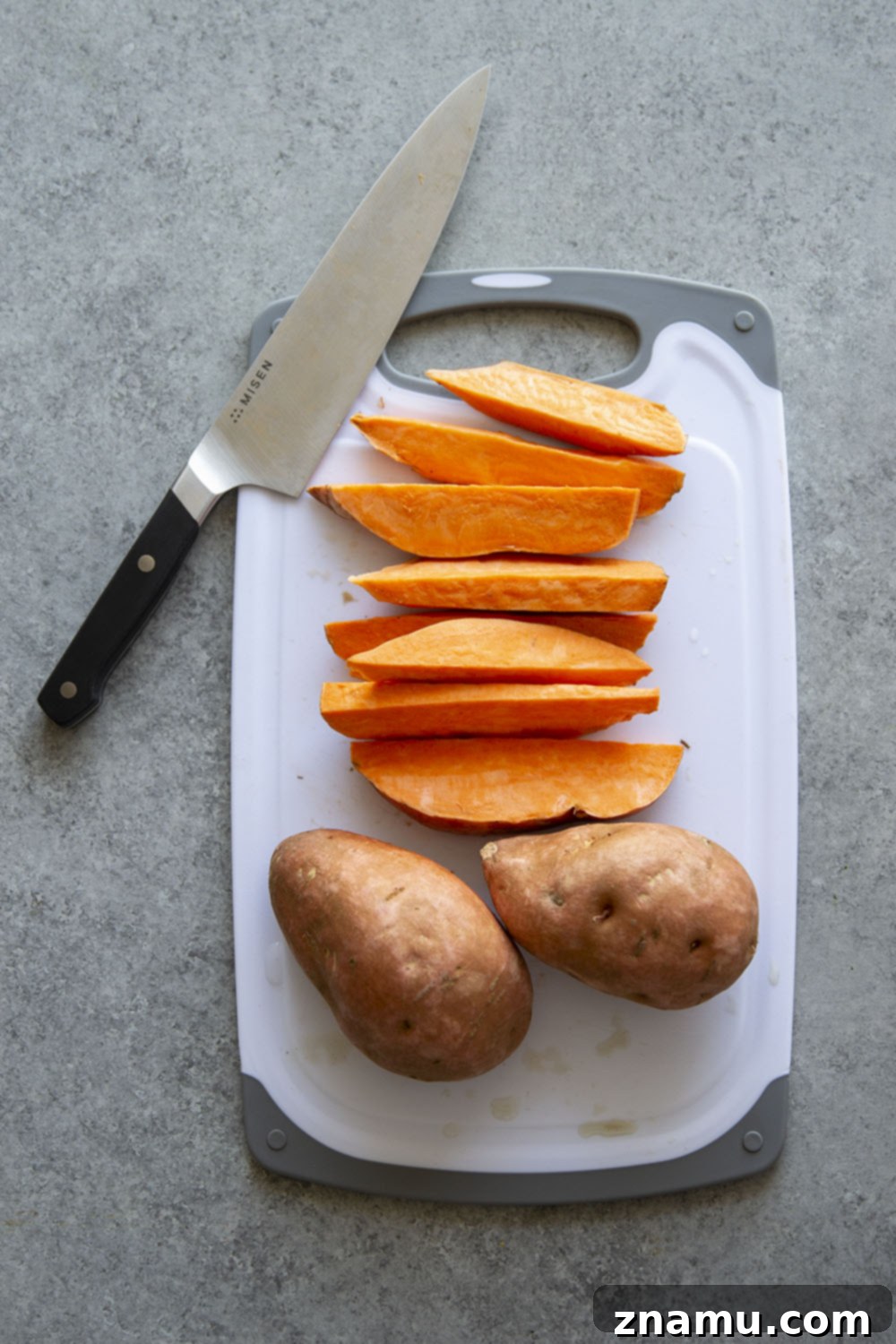Fiery Harissa Sweet Potato Wedges with Cool Garlic Herb Aioli 5 Harissa roast sweet potato wedges pack a flavorful punch of heat and are perfectly crispy on the outside and fluffy on the inside.-- serve with a garlic herb aioli for dipping!