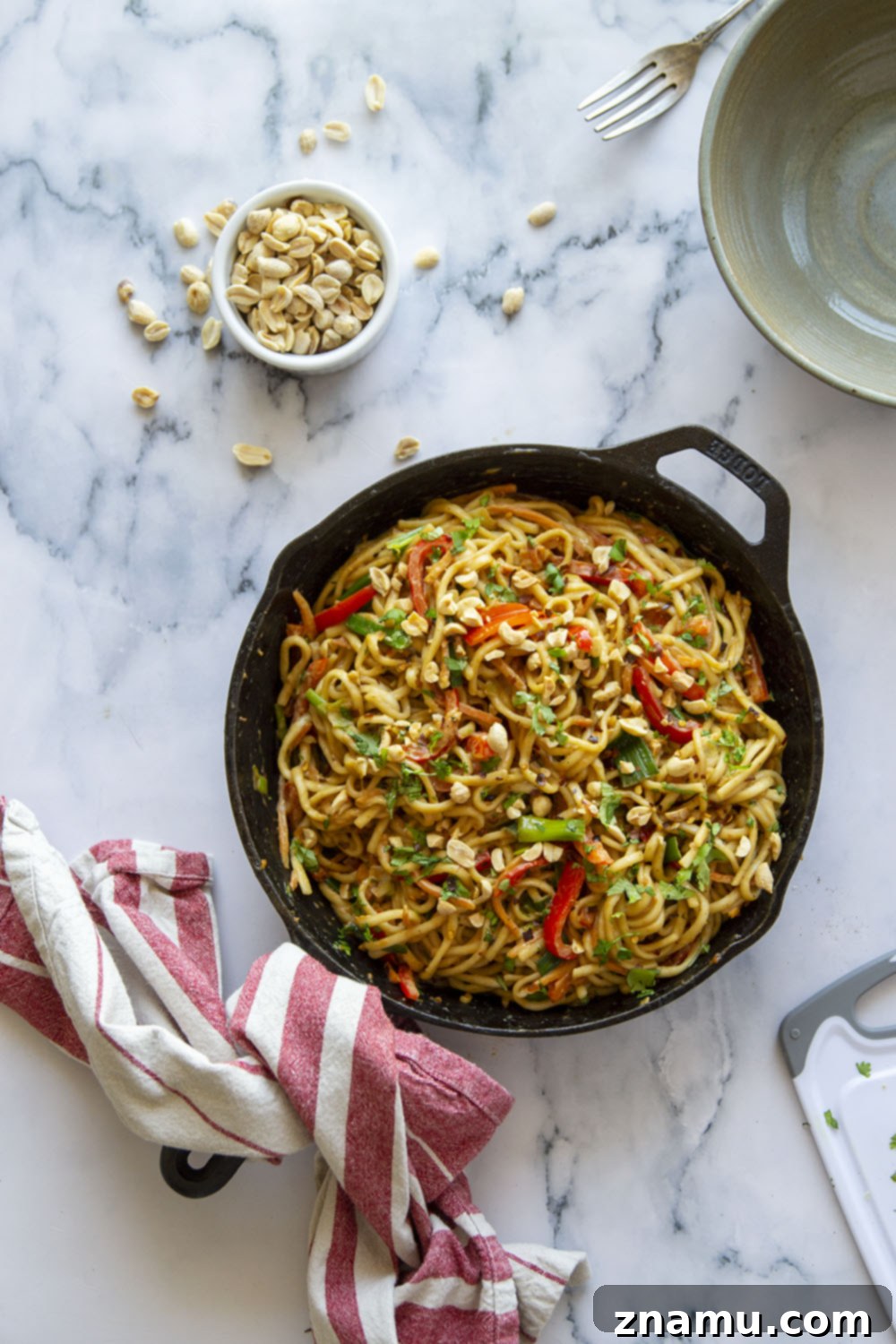 One-Pan Fiery Peanut Noodles 4 Spicy peanut noodles are made in minutes in a skillet and packed with tender vegetables and noodles in a perfectly creamy, spicy peanut sauce.