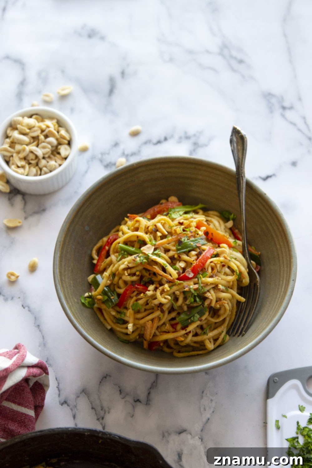 One-Pan Fiery Peanut Noodles 6 Spicy peanut noodles are made in minutes in a skillet and packed with tender vegetables and noodles in a perfectly creamy, spicy peanut sauce.