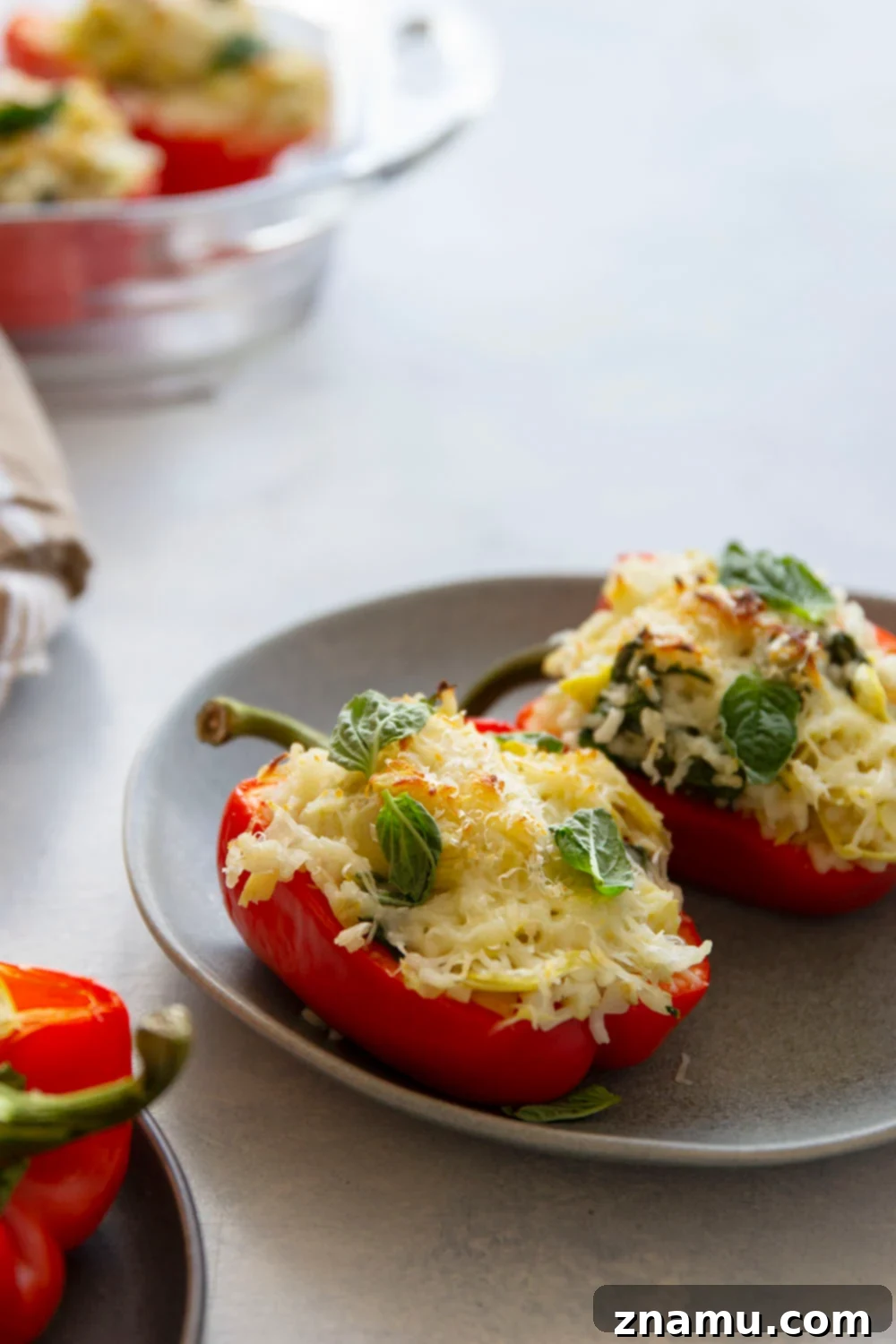 Creamy Spinach Artichoke Risotto Stuffed Bell Peppers 3 Risotto stuffed peppers feature a creamy spinach artichoke risotto stuffed into big sweet peppers and covered in melty mozzarella and fresh herbs.