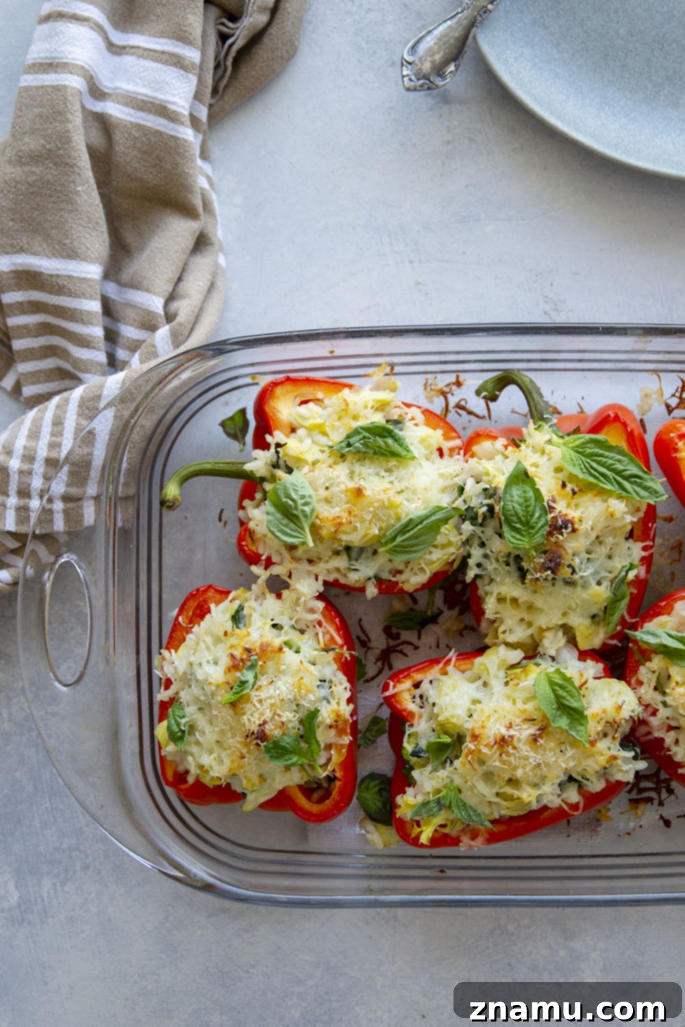 Creamy Spinach Artichoke Risotto Stuffed Bell Peppers 5 Risotto stuffed peppers feature a creamy spinach artichoke risotto stuffed into big sweet peppers and covered in melty mozzarella and fresh herbs.