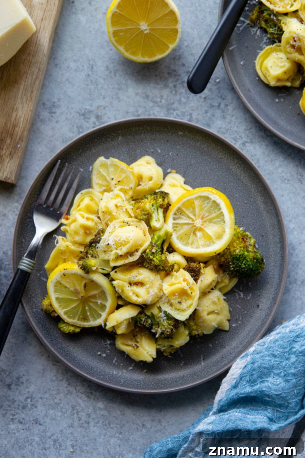 Zesty Roasted Broccoli Tortellini 2 Vibrant Lemon Roasted Broccoli Tortellini dish, perfect for a quick and healthy weeknight dinner. Featuring golden-roasted broccoli florets and tender cheese tortellini tossed in a light lemon garlic sauce.