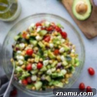 Creamy Italian Avocado Chickpea Salad 8 Dressed in a tangy Italian dressing and packed full of fresh ingredients, this Italian avocado chickpea salad is loaded with flavor and an easy lunch salad or side dish!