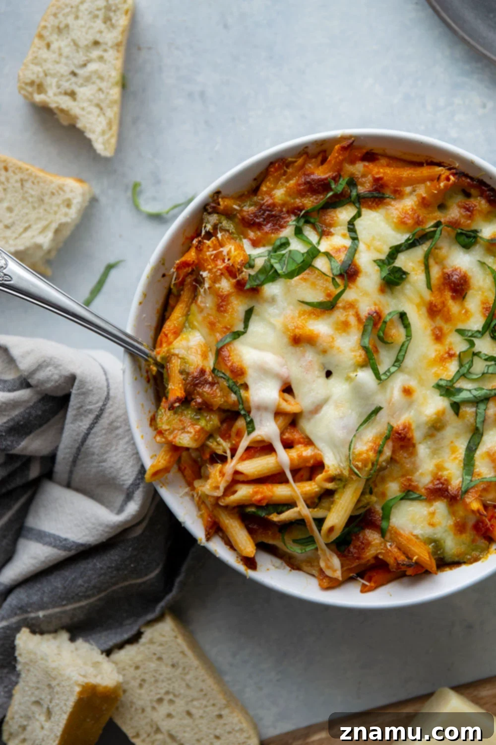 Penne Alla Vodka Pesto Bake 2 Baked penne alla vodka features a rich homemade tomato vodka sauce, swirls of flavorful pesto, and lots of gooey cheese baked on top.