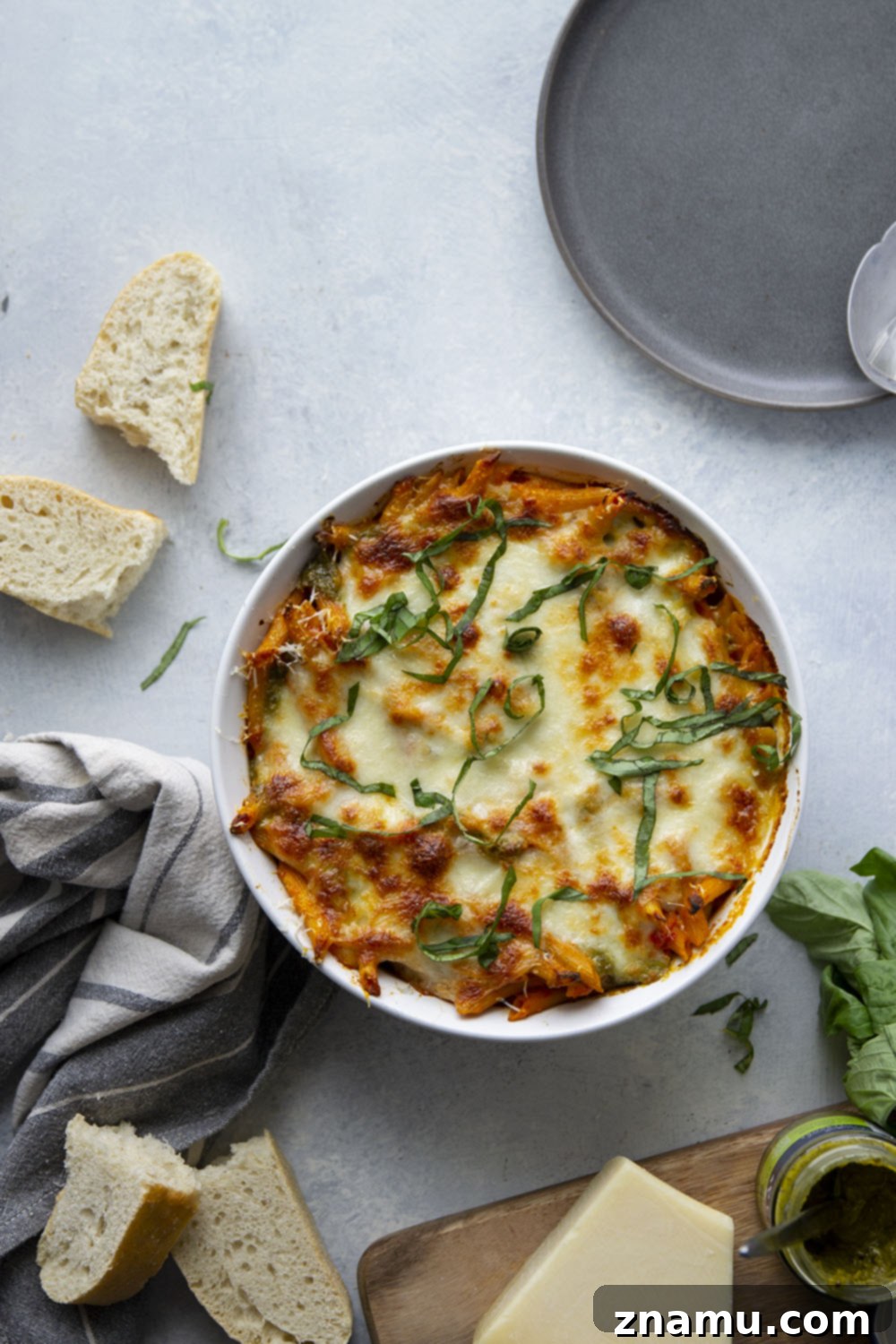 Penne Alla Vodka Pesto Bake 5 Baked penne alla vodka features a rich homemade tomato vodka sauce, swirls of flavorful pesto, and lots of gooey cheese baked on top.