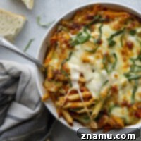 Penne Alla Vodka Pesto Bake 8 Baked penne alla vodka features a rich homemade tomato vodka sauce, swirls of flavorful pesto, and lots of gooey cheese baked on top.