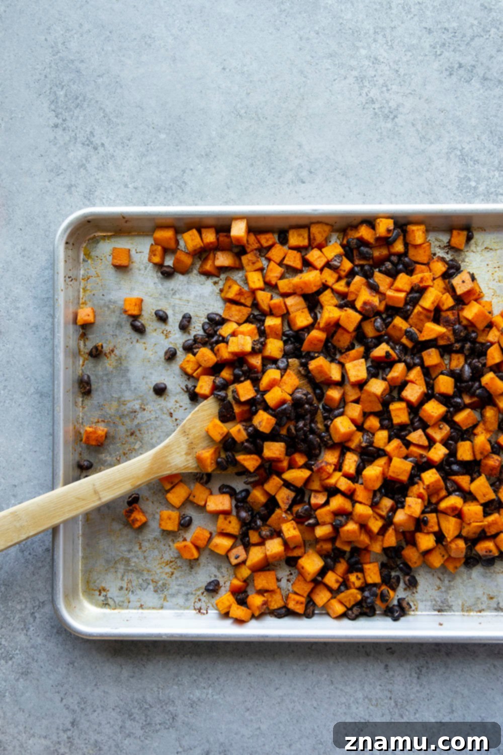 Vibrant Black Bean & Sweet Potato Burrito Bowls with Tangy Lime-Cilantro Drizzle 5 Black bean sweet potato burrito bowls are loaded with fluffy steamed rice, tender roasted sweet potatoes and black beans, a creamy cilantro lime sauce, and all your favorite burrito toppings!
